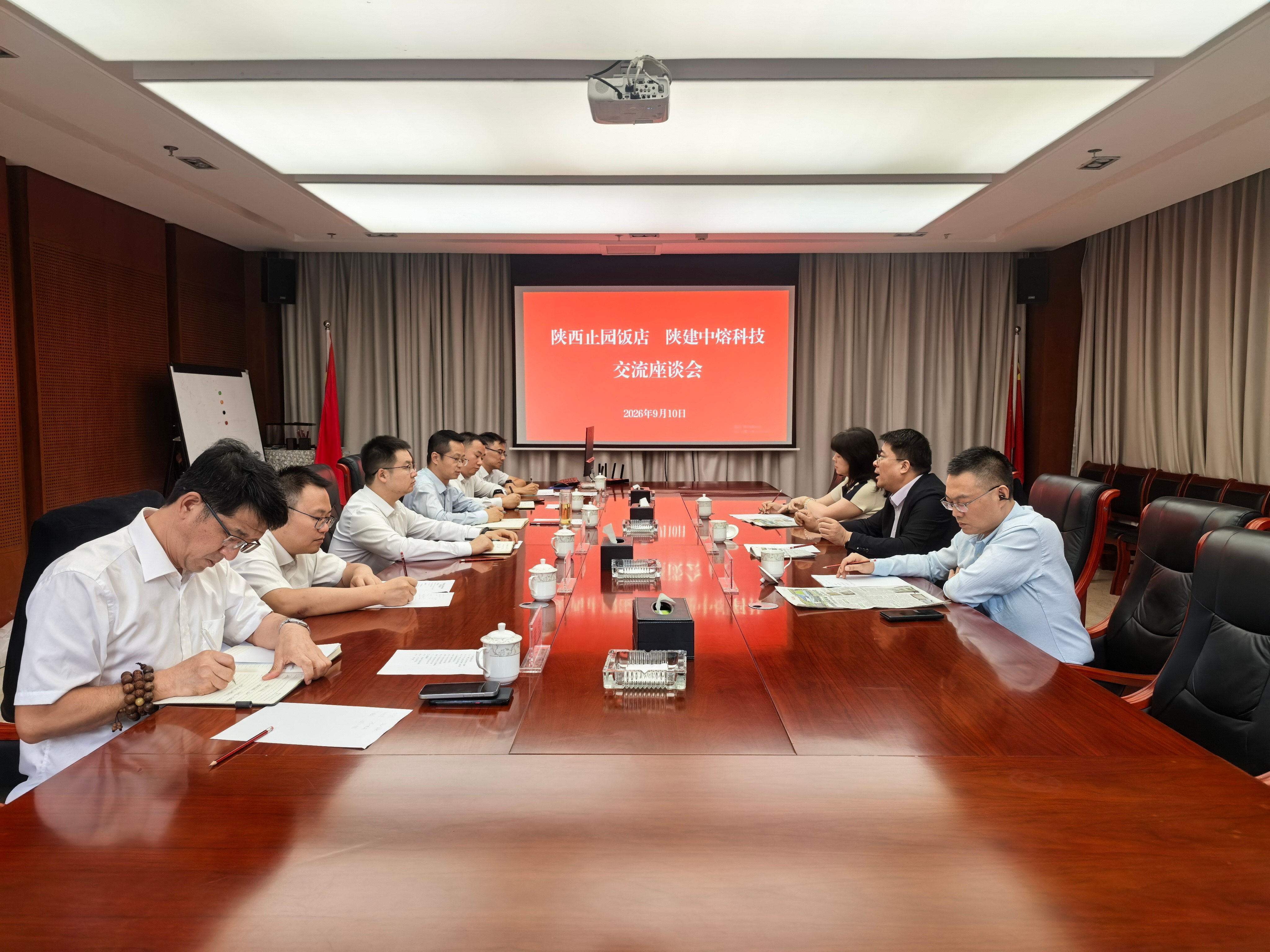 止园饭店领导班子一行赴陕建中熔科技调研交流